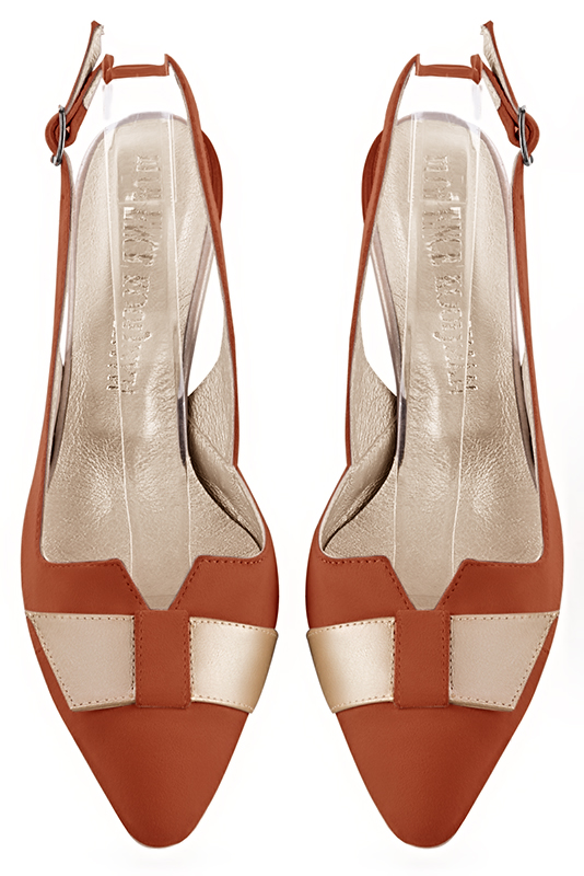 Terracotta orange women's dress pumps, with a knot on the front. Tapered toe. Medium comma heels. Top view - Florence KOOIJMAN